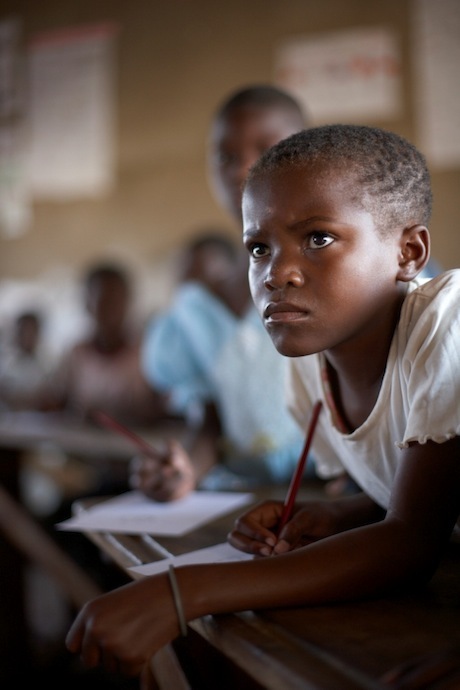 Child learning hard at school in Kenya Child learning hard at school in Kenya