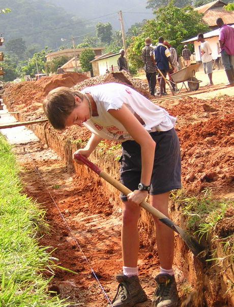 Helping out the locals with some digging  Helping out the locals with some digging