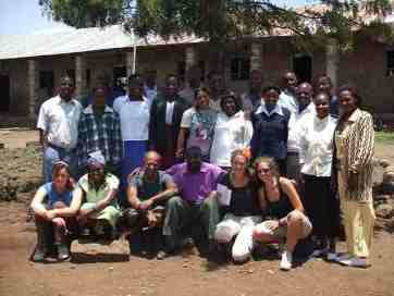 Volunteers with the school staff and workers Volunteers with the school staff and workers