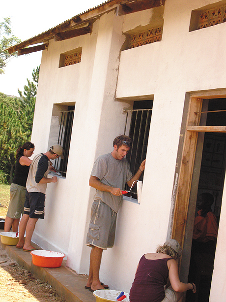 Helping out painting at a local Uganda school Helping out painting at a local Uganda school